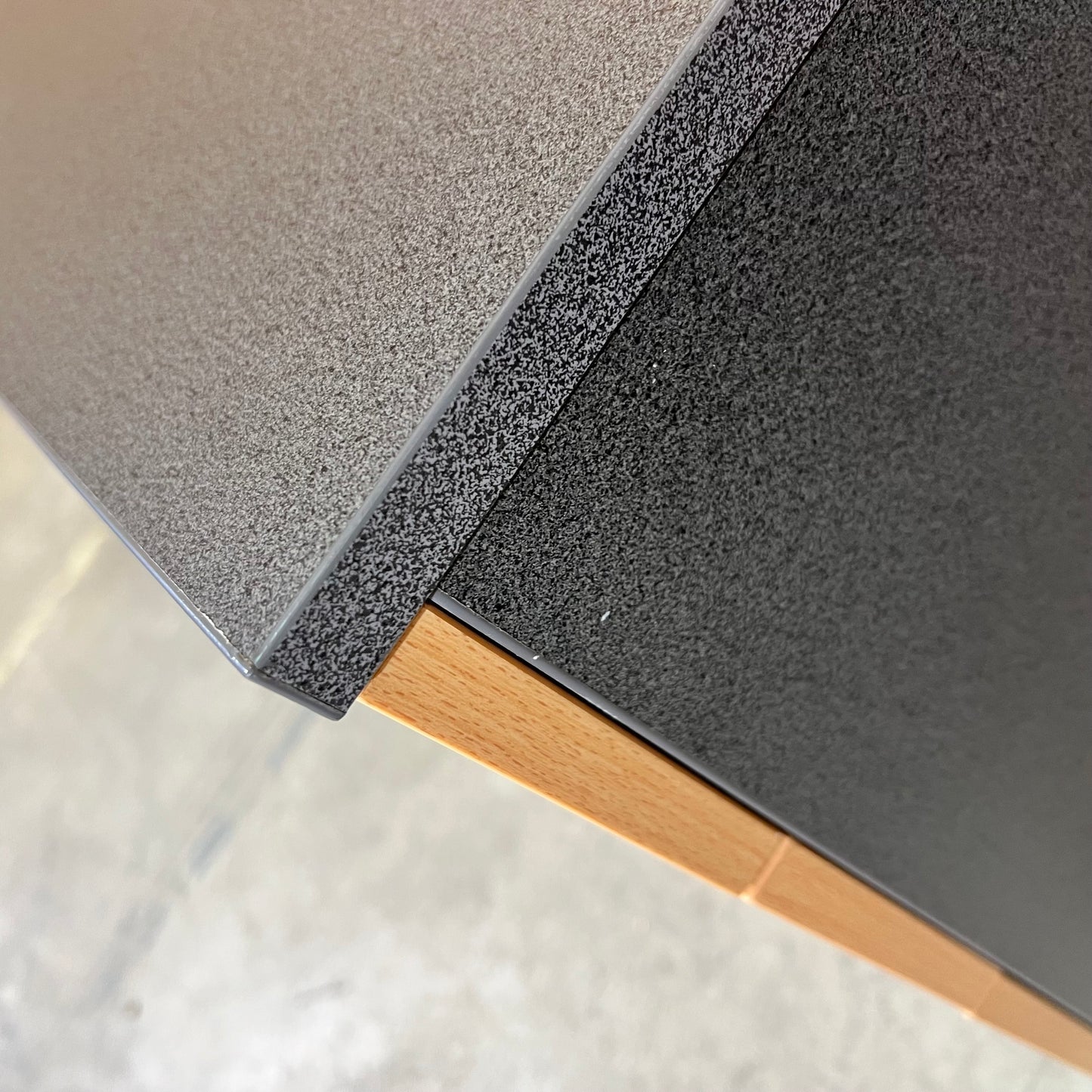 Charcoal and tan pedestal
