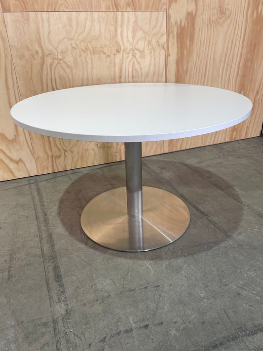 White round meeting table on chrome base