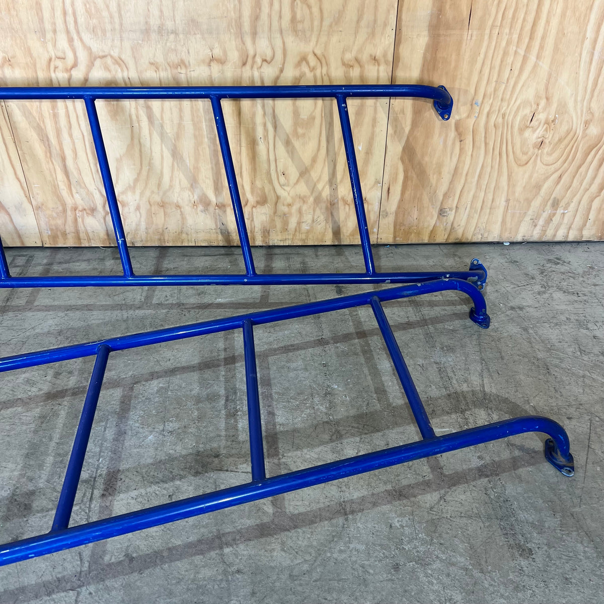 Set of Blue Metal Playground Skewed Ladders