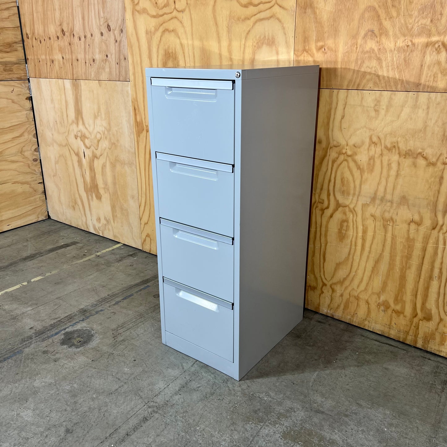 Grey Metal Four Drawer Filing Cabinet