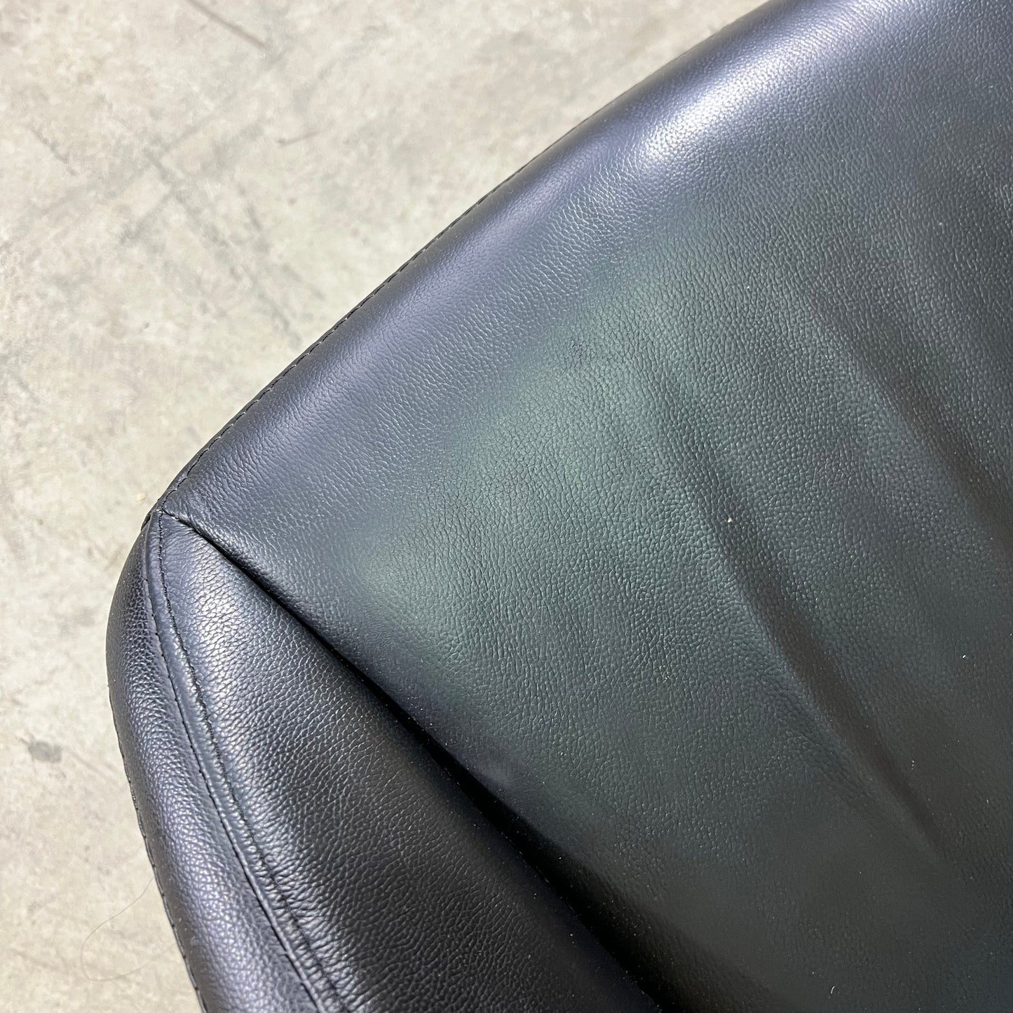 Black leather executive chair with arms