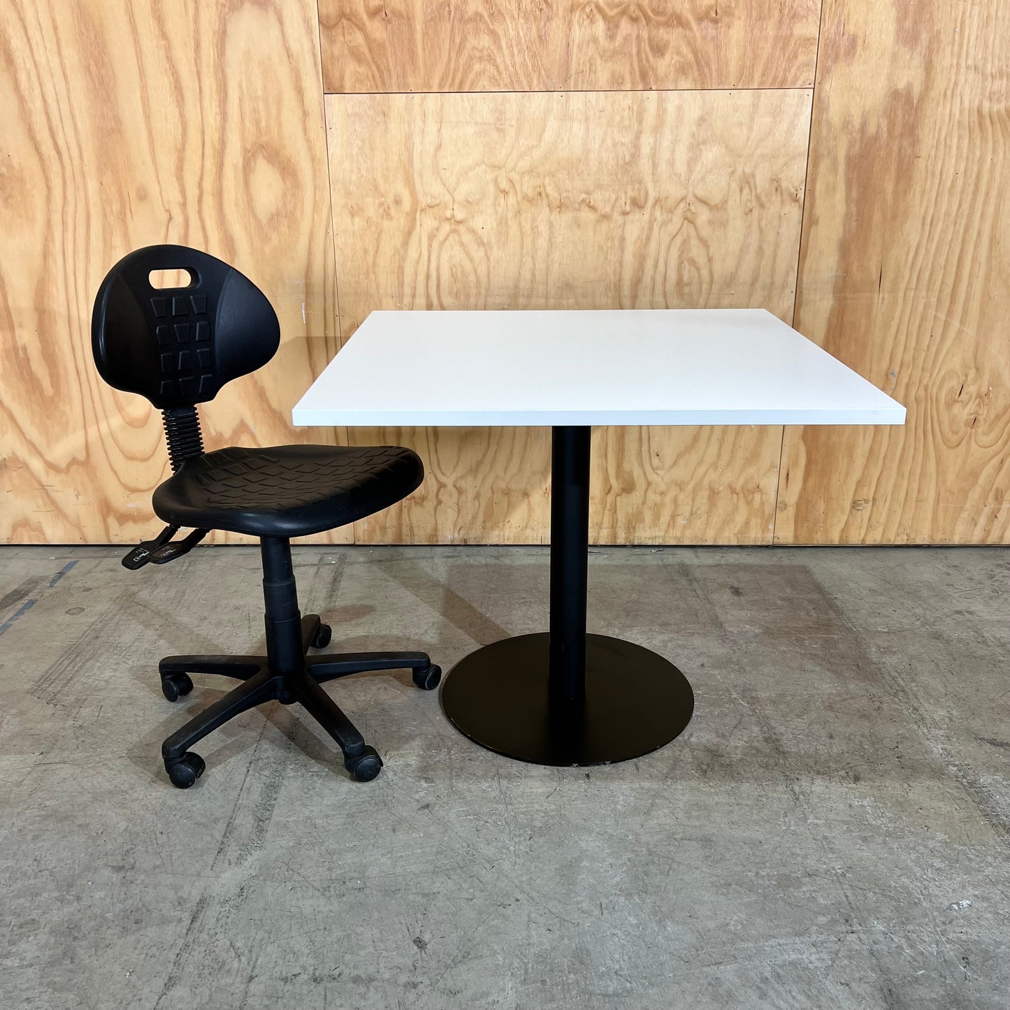 White Square Table on Black Metal Base