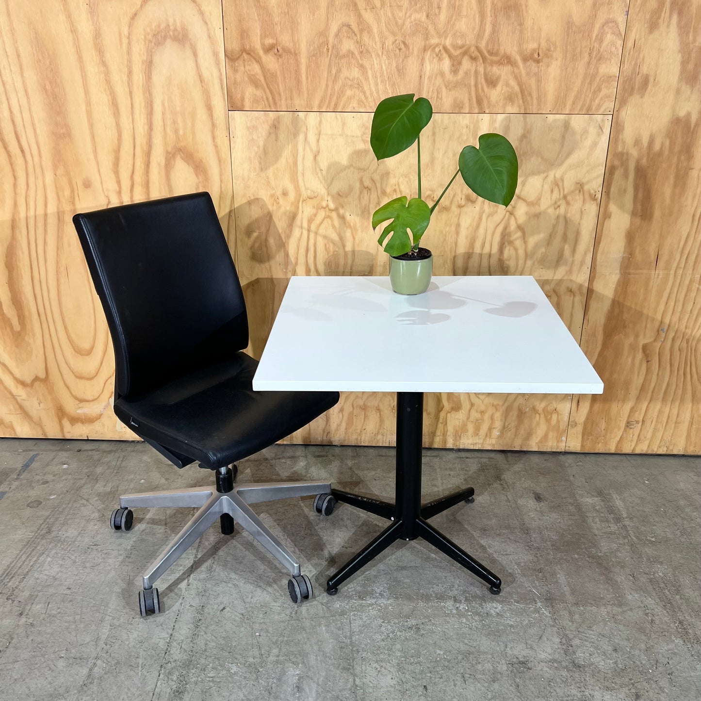 Square White Table on Black Metal Base
