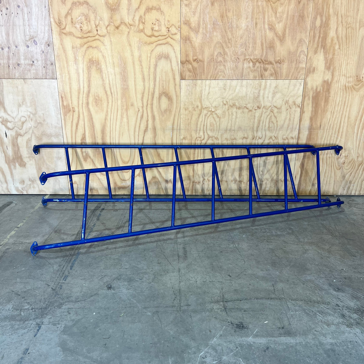 Set of Blue Metal Playground Skewed Ladders
