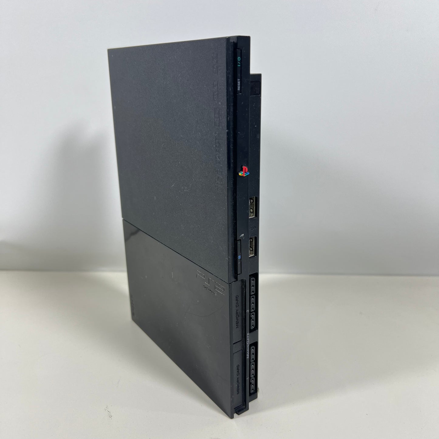 Sony PlayStation 2 Slim SCPH-90002 With a Controller