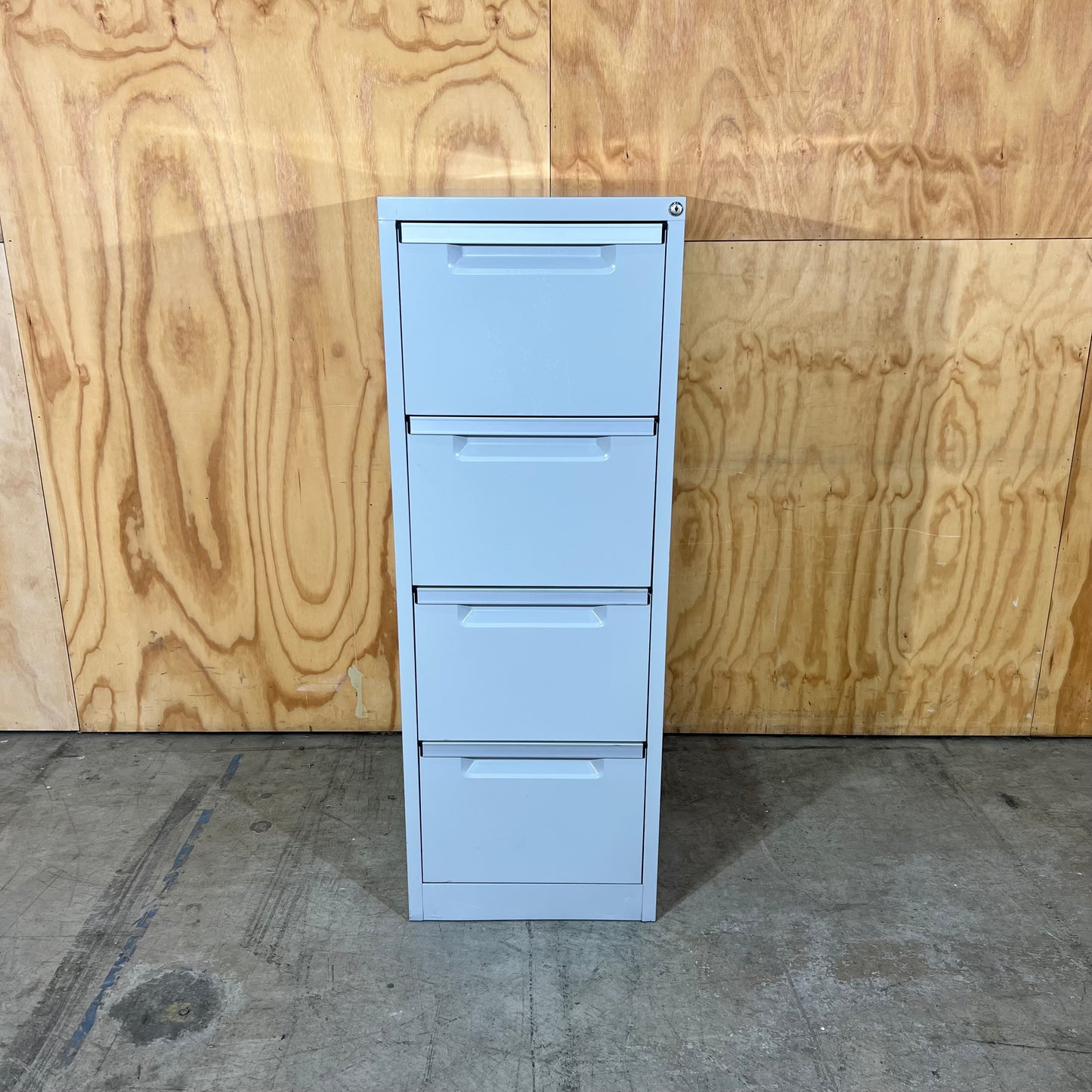 Grey Metal Four Drawer Filing Cabinet