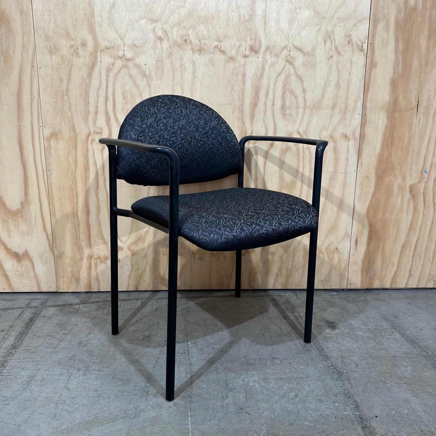 Black and grey visitor chair