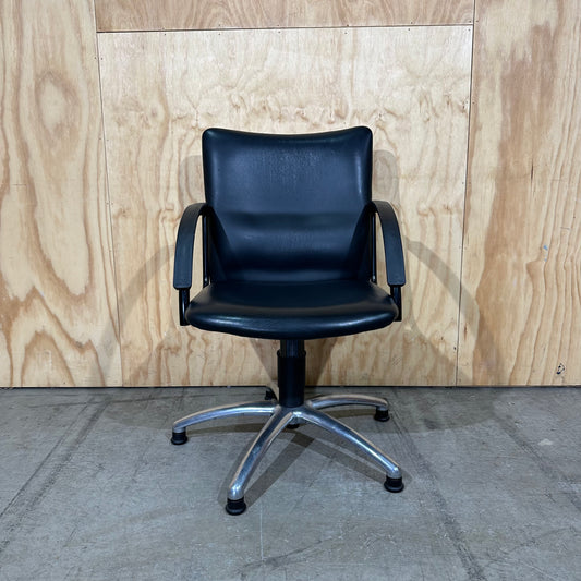 Black faux leather swivel chair on chrome base by Pago