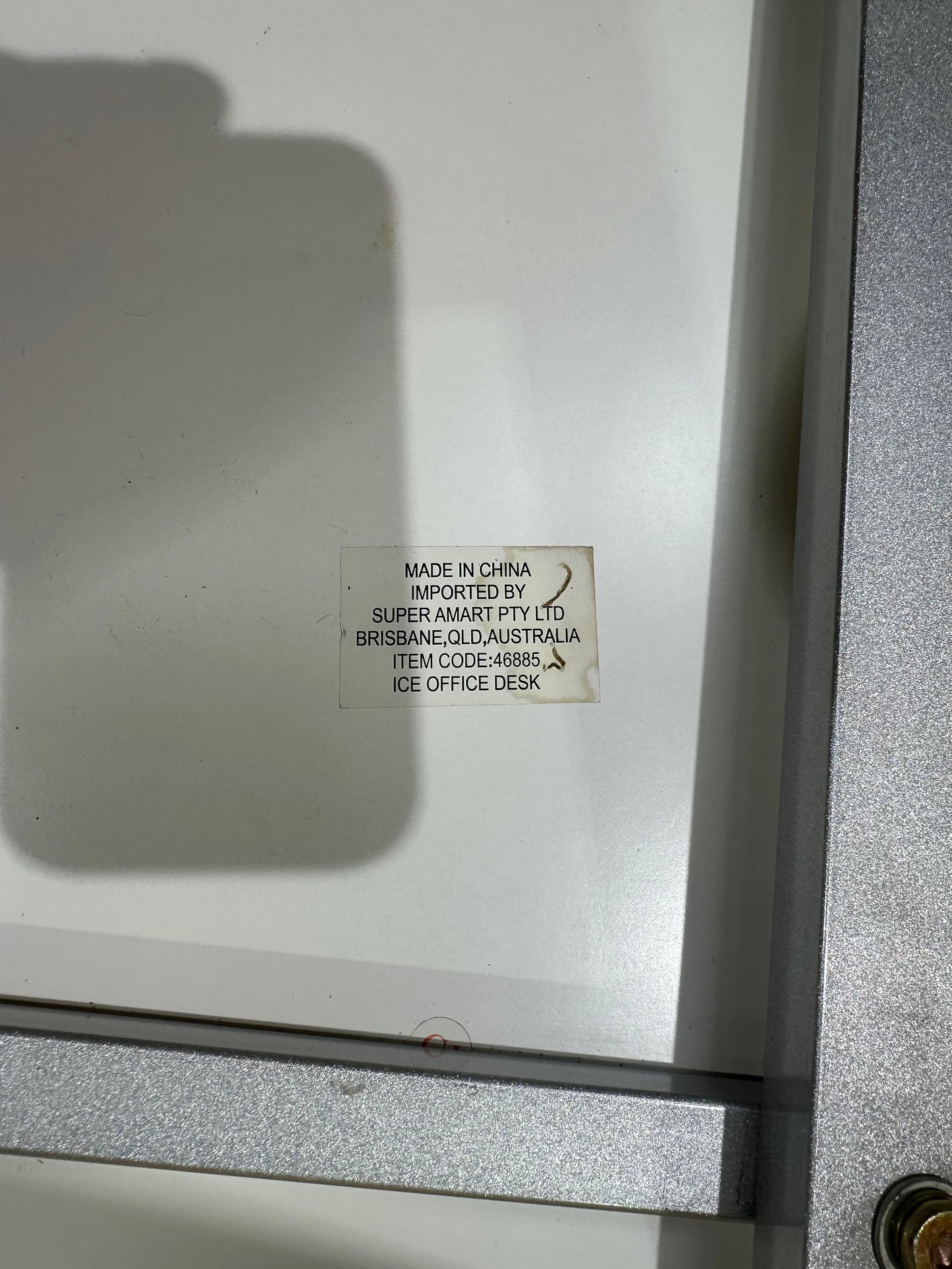 White table on solid metal base by Amart