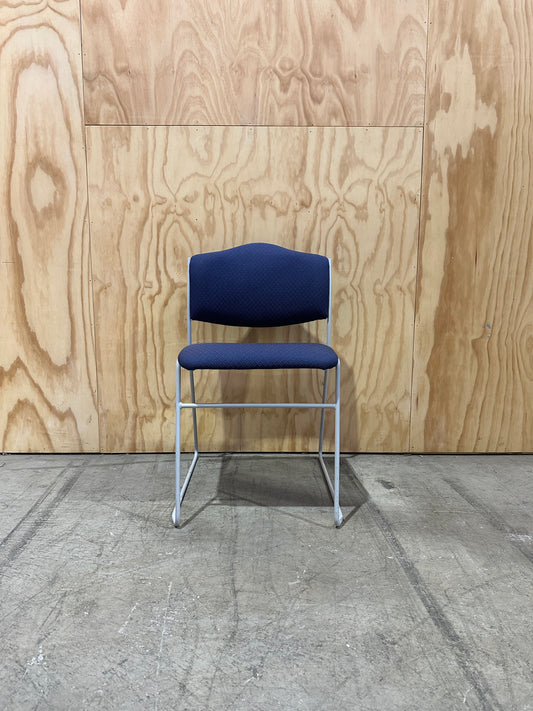 Blue Patterned Waiting Room Chair on White Sled Legs