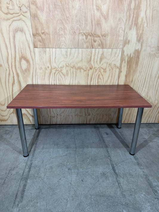 Timber veneered meeting table on chrome legs