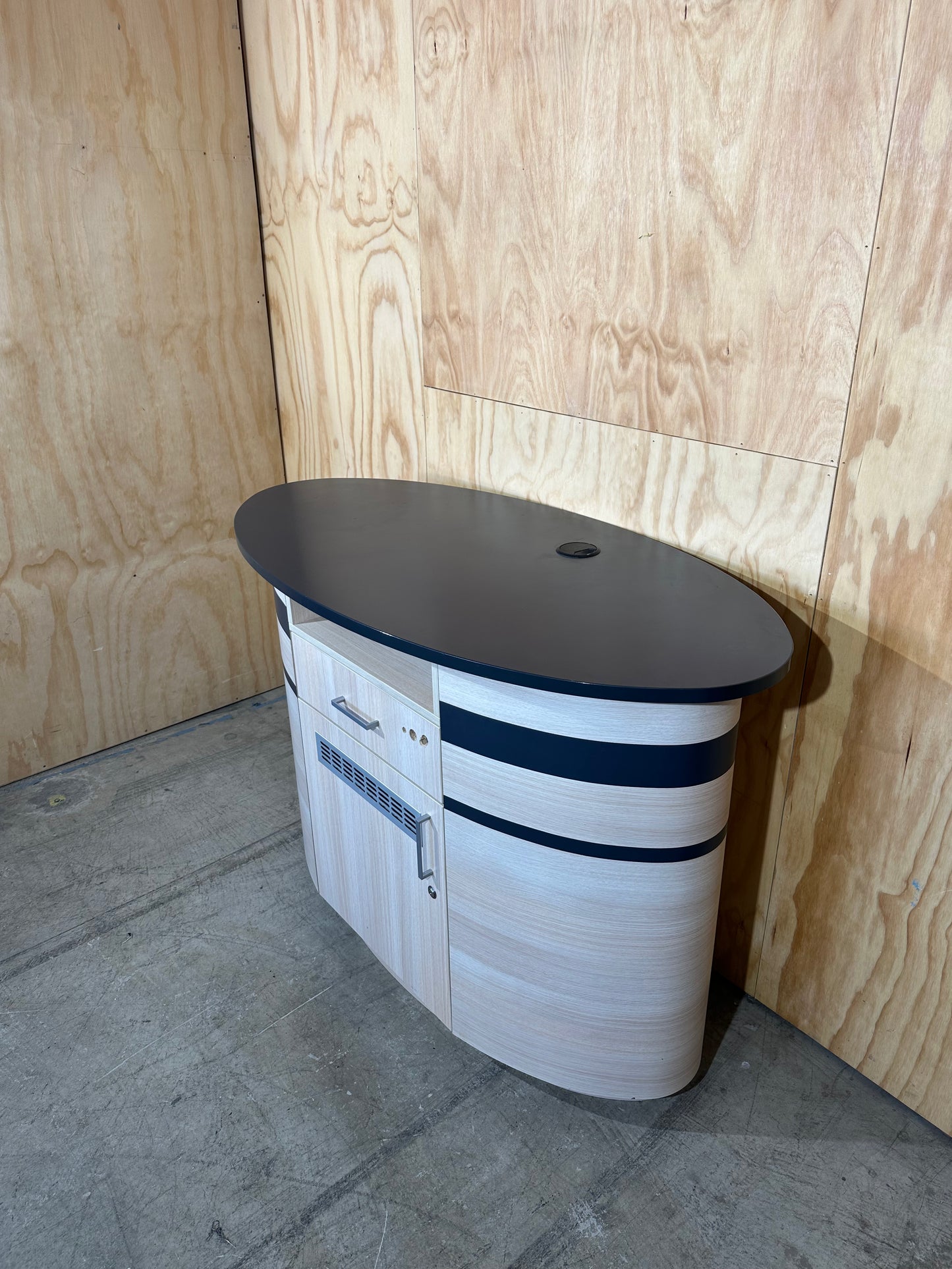 Oval desk/storage unit