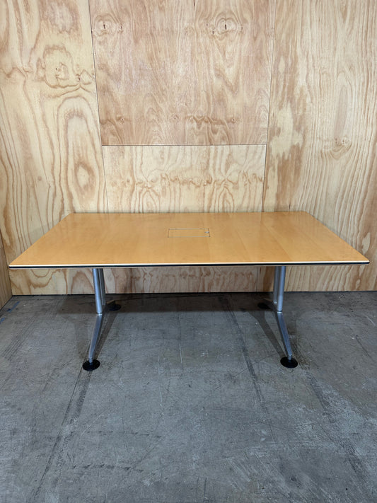 Meeting table with chrome legs and powerbox