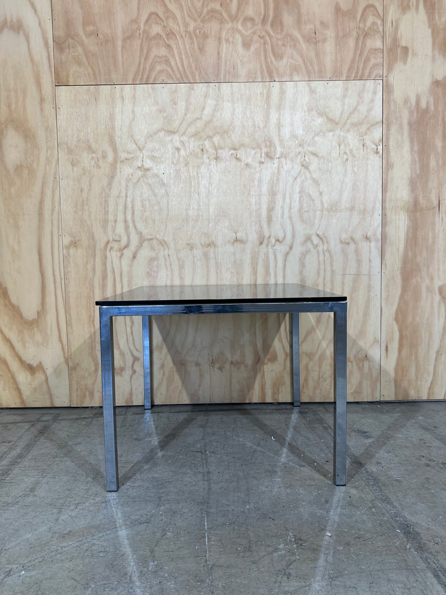 Square smoked glass coffee table on chrome base