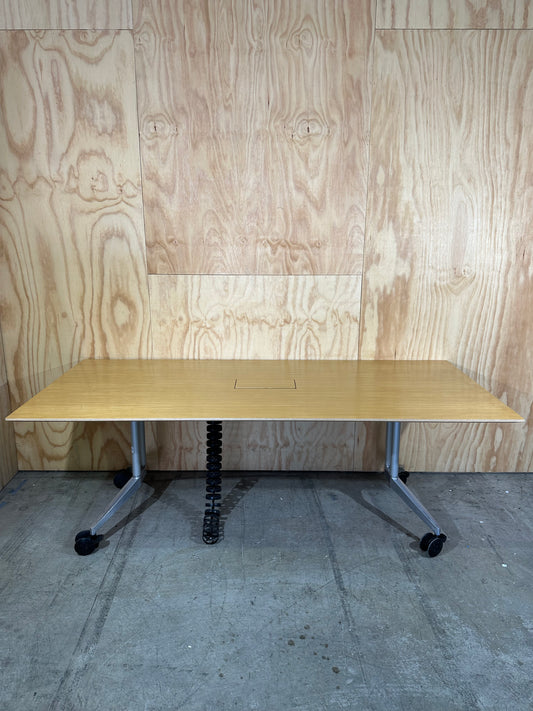 Wilkhahn meeting table with cable management on castors