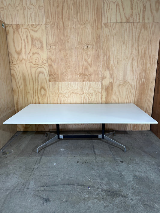 White boardroom table on Eames base