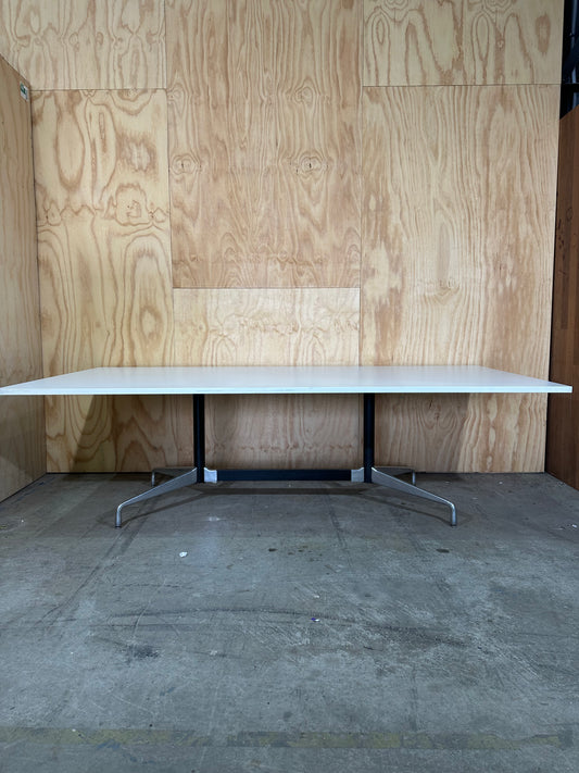 White boardroom table on Eames base