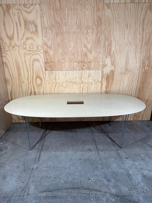 Boardroom table in beech veneer with Eiffel tower legs