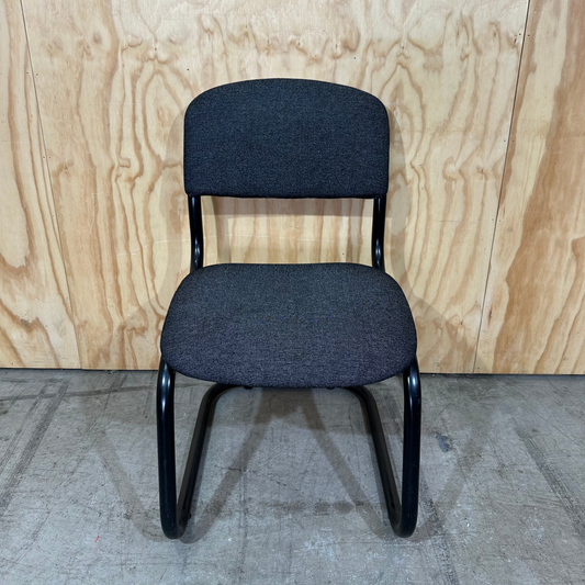 Upholstered grey cantilever chair