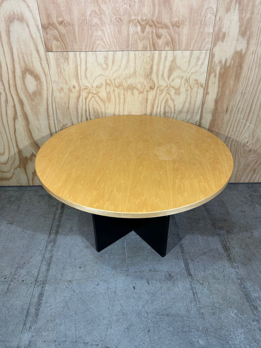 Round meeting table on black base