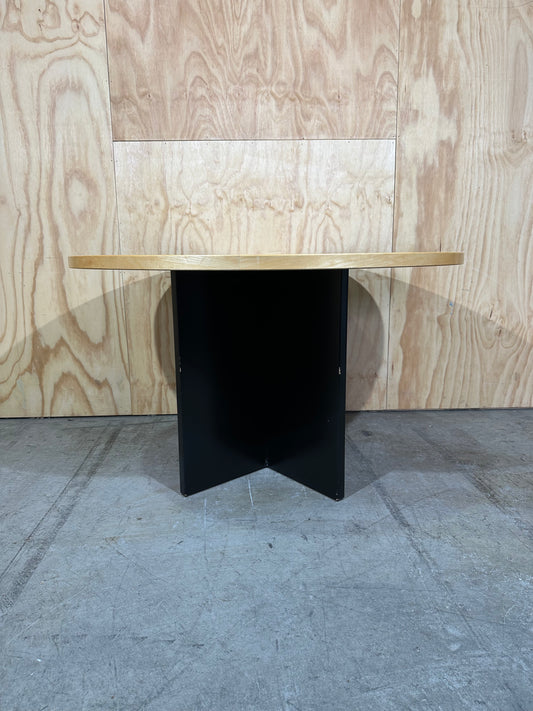 Round meeting table on black base