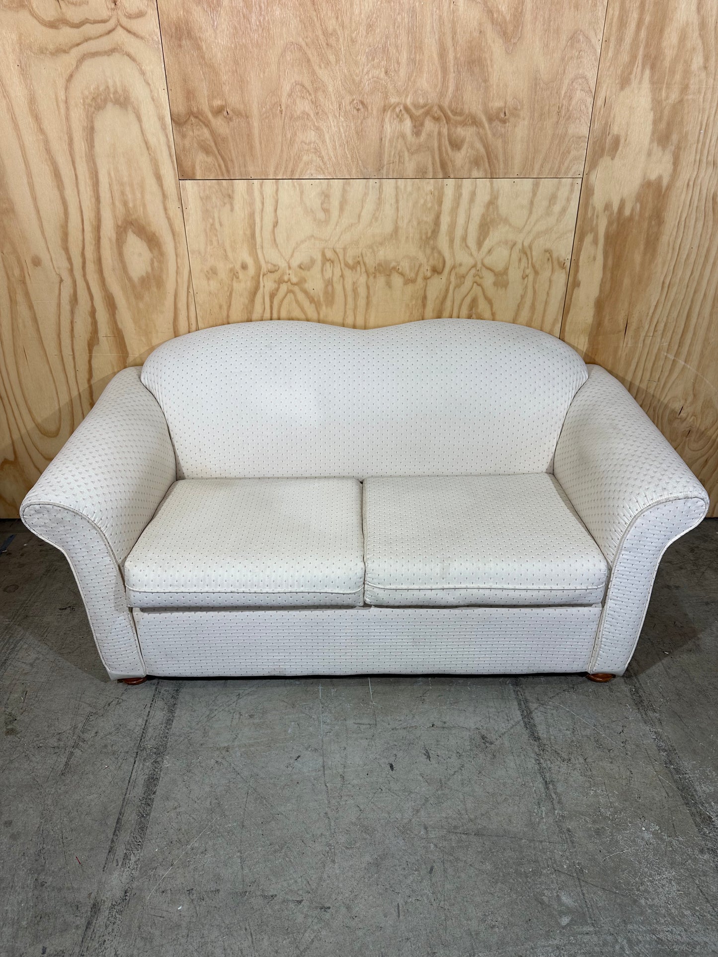 White couch with pattern