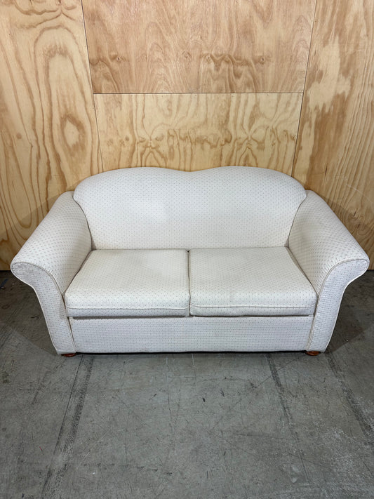White couch with pattern