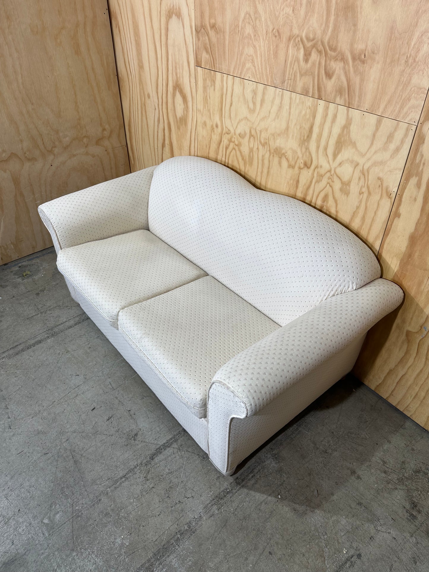 White couch with pattern