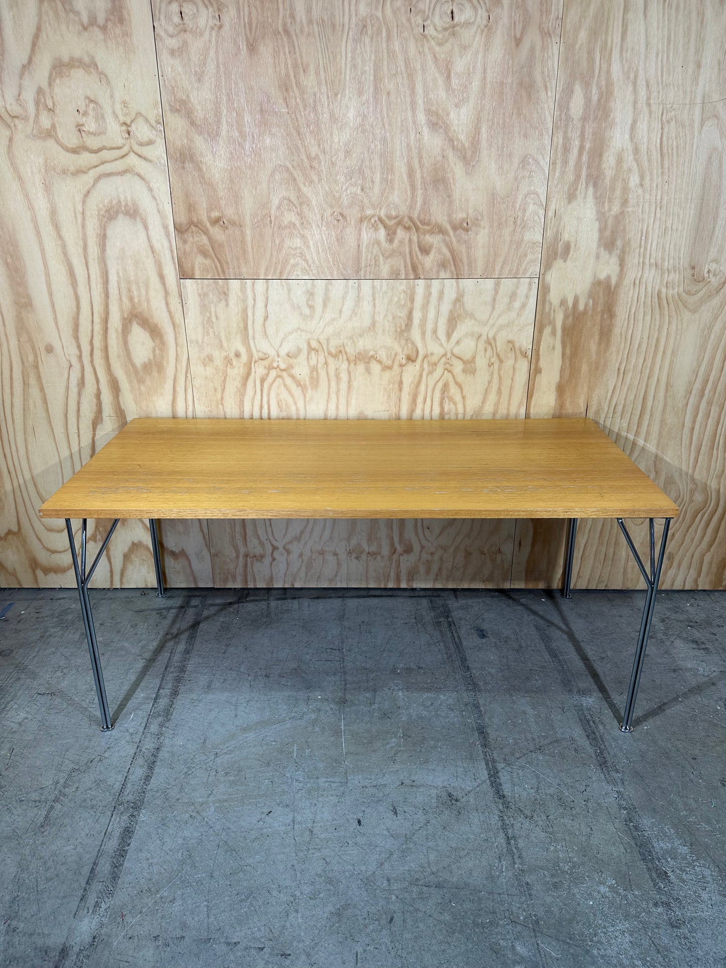 Timber topped table on chrome legs