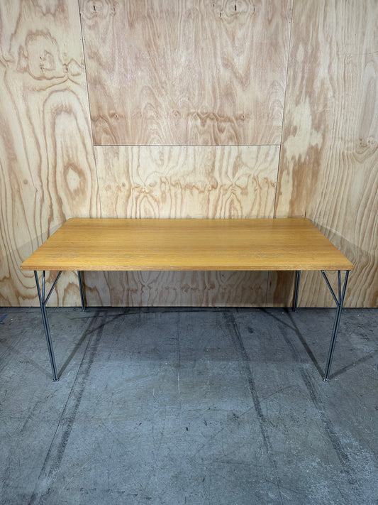 Timber topped table on chrome legs