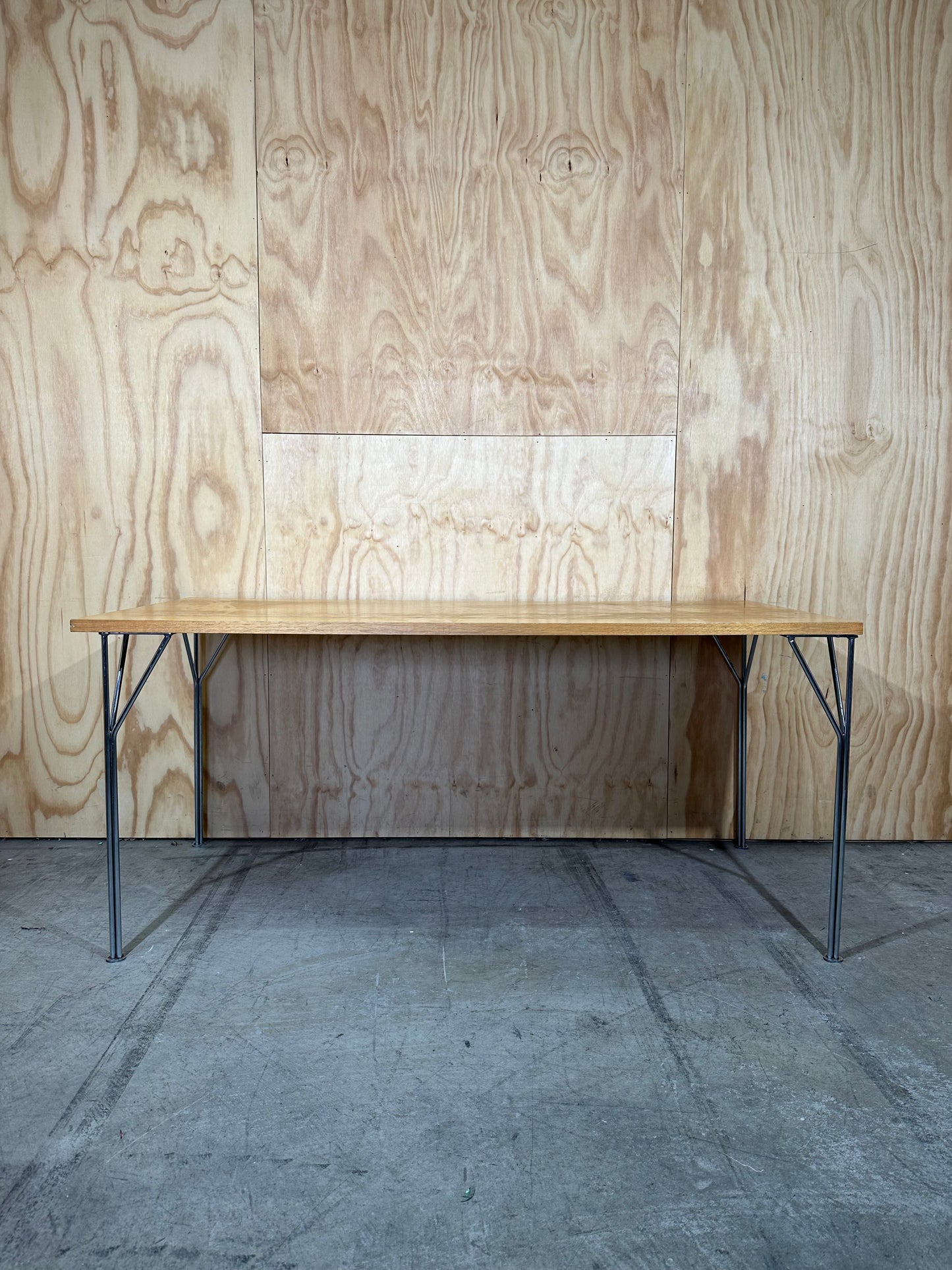 Timber topped table on chrome legs