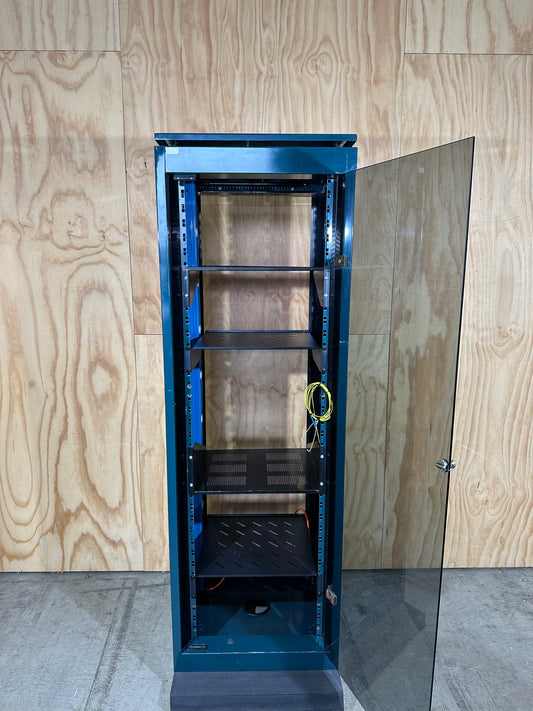 Tall dark green server cabinet with glass doors