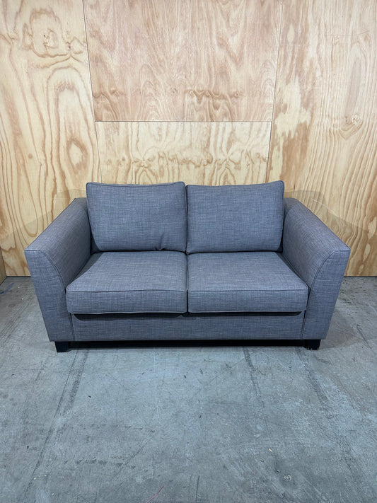 Grey 2 seater couch by Ridge Furniture