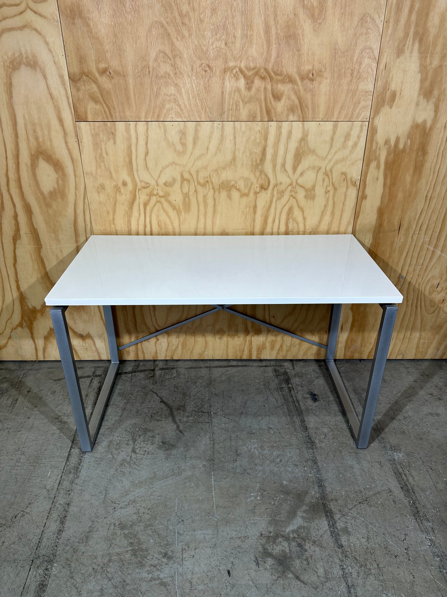 White table on solid metal base by Amart
