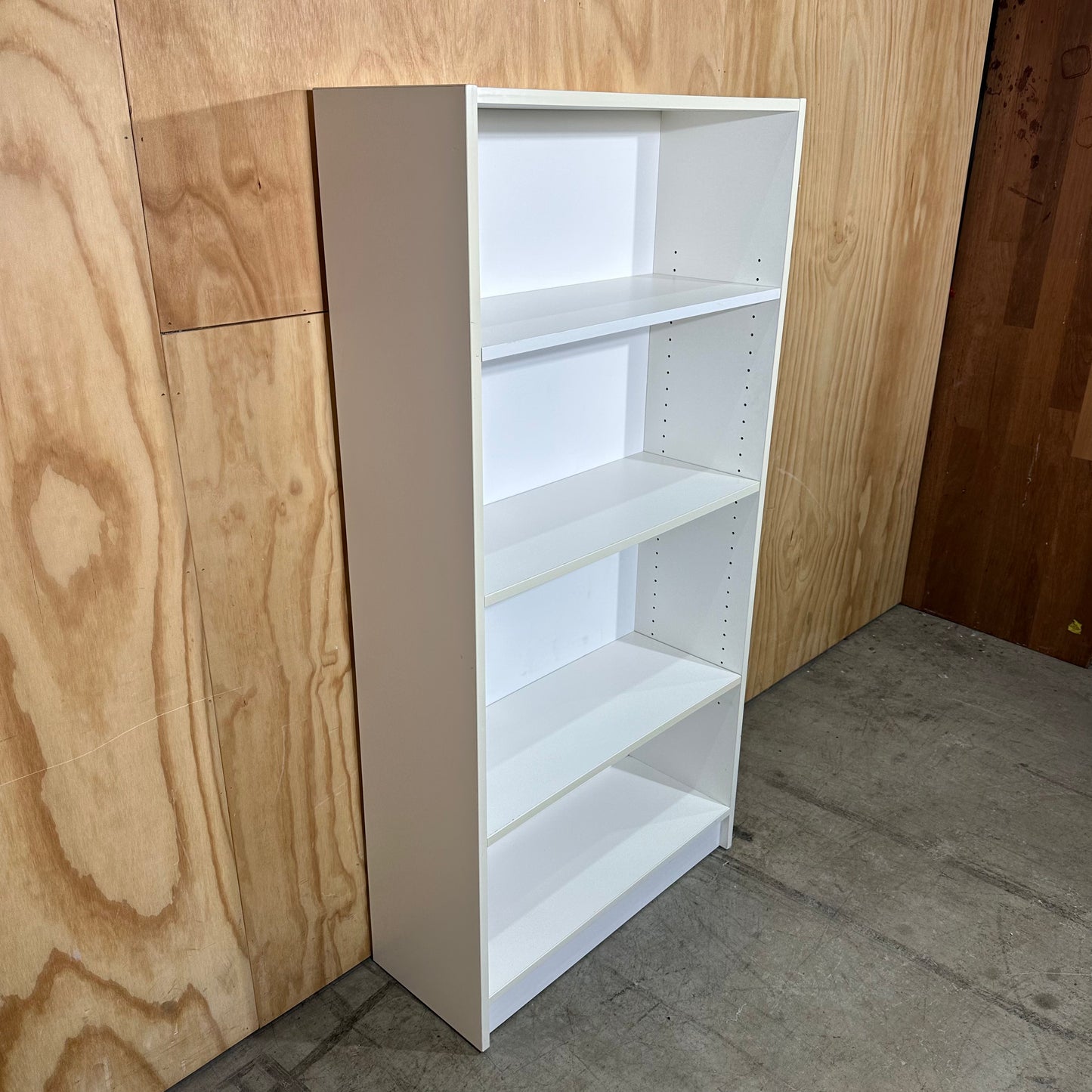 White wooden bookshelf