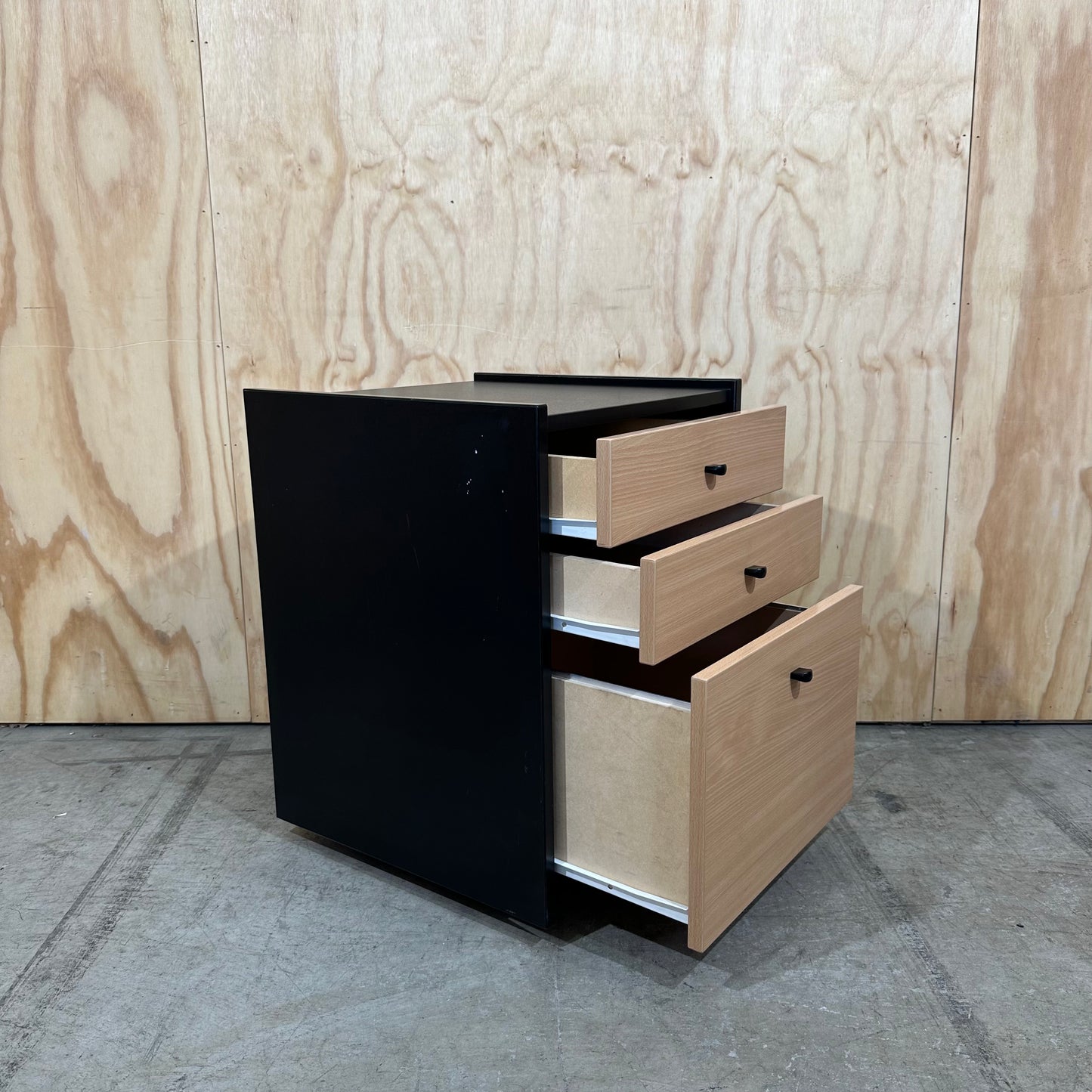 Black and wood veneer pedestal 3 drawers