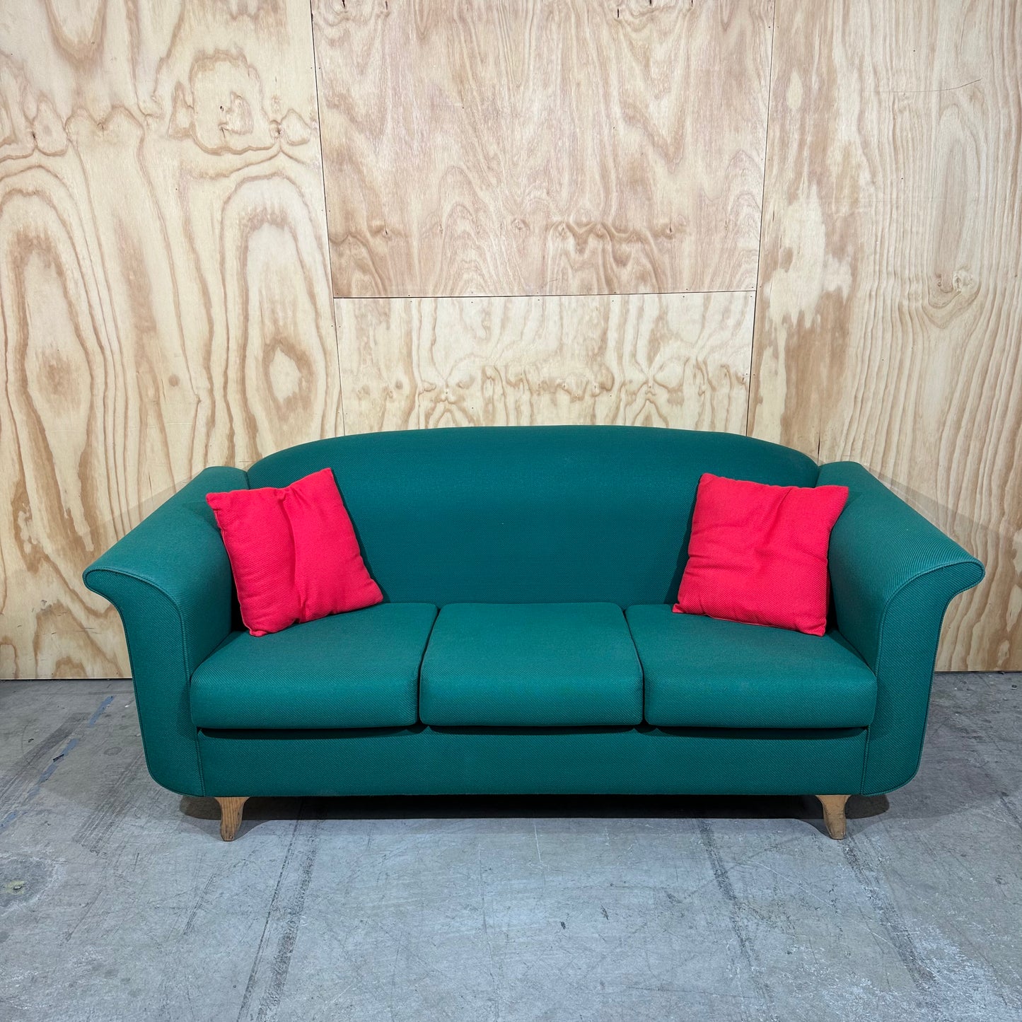 Three seater couch in emerald greeen