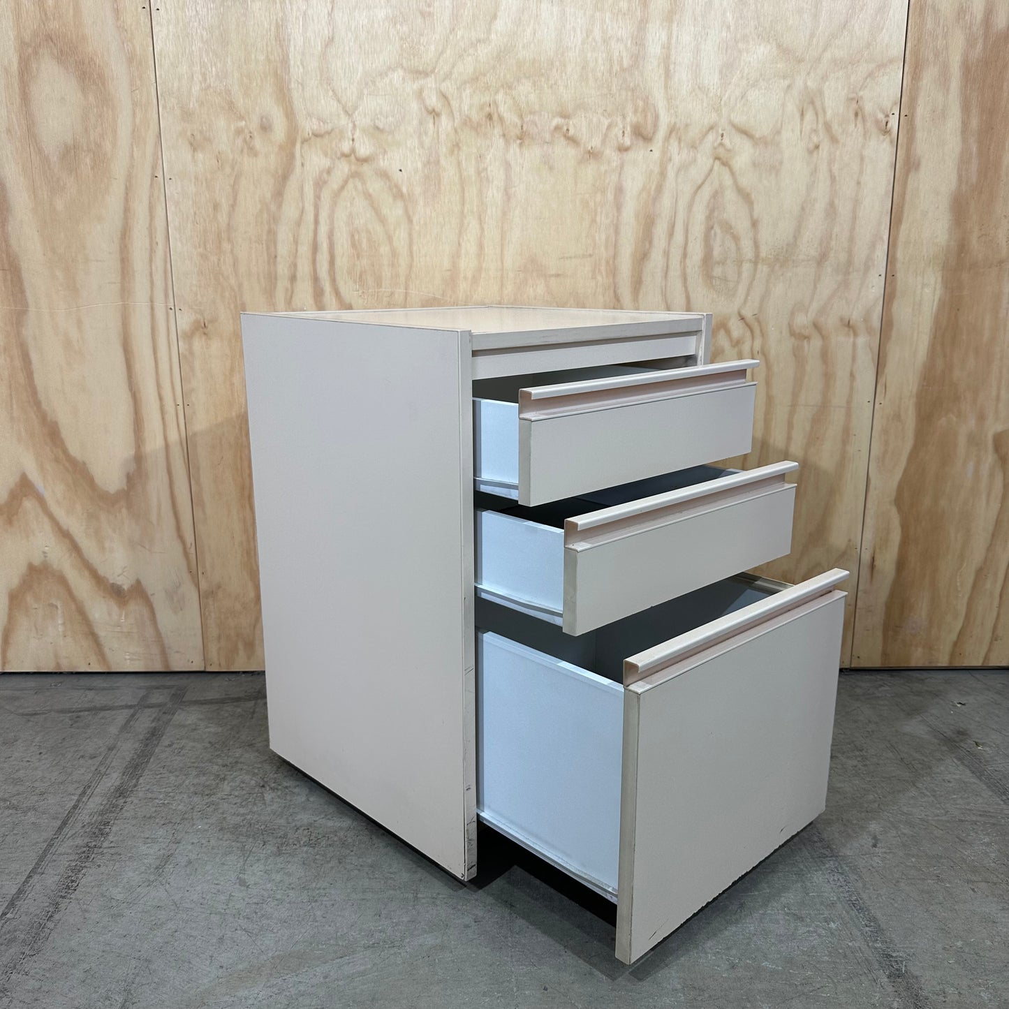 Beige three drawer pedestal