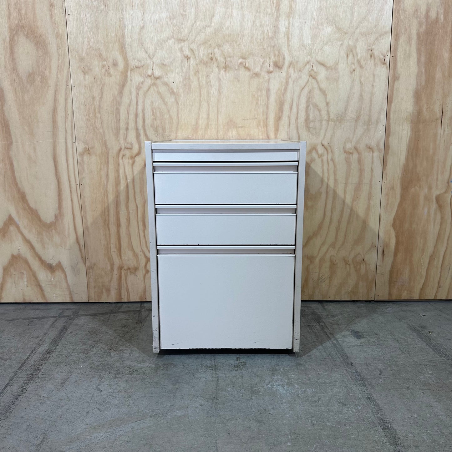 Beige three drawer pedestal
