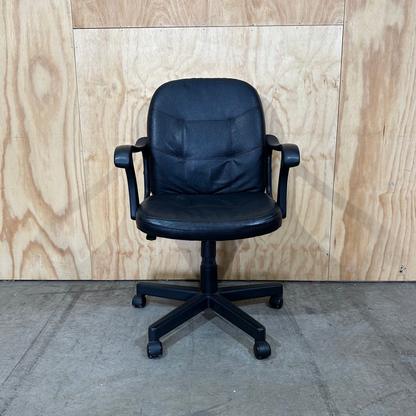 Executive faux leather mid-back swivel chair