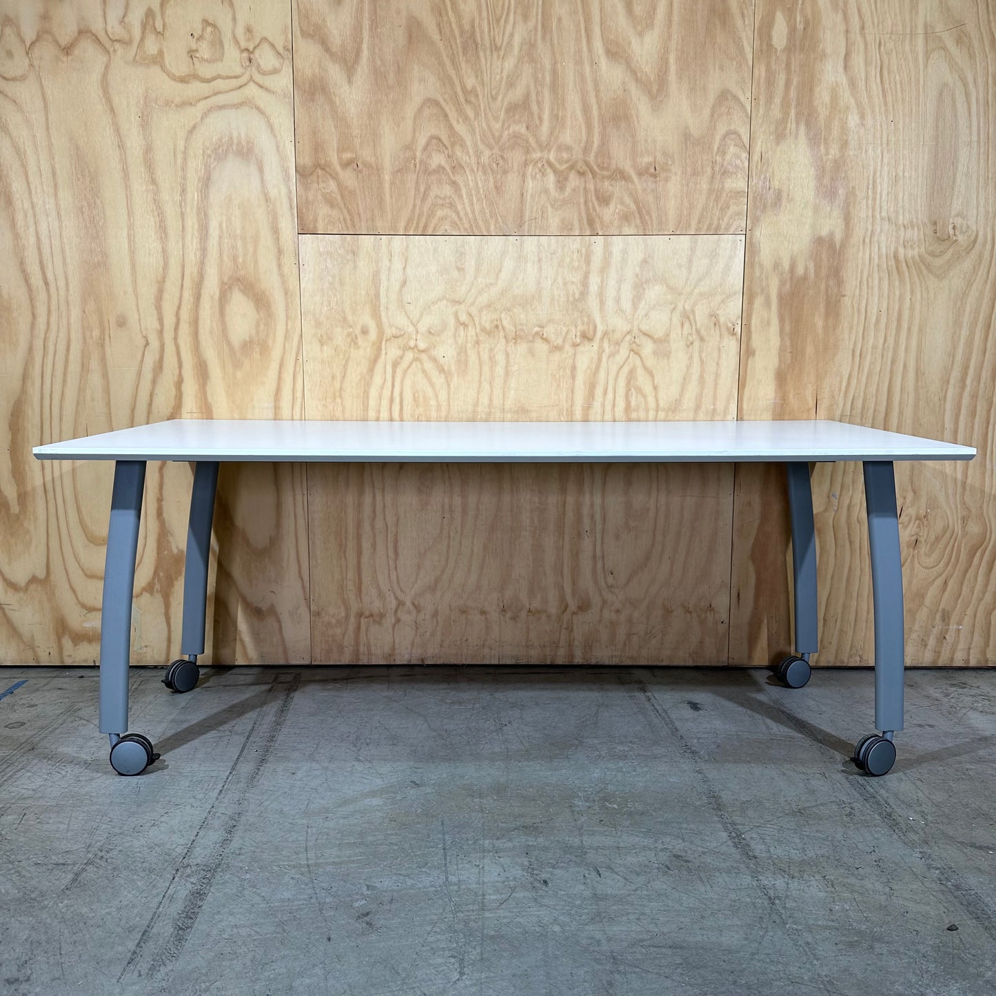 White Table on Castor Wheels