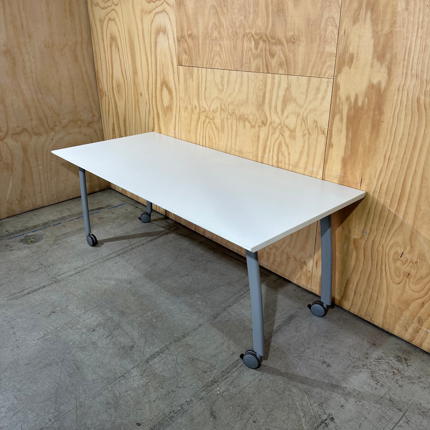 White Table on Castor Wheels