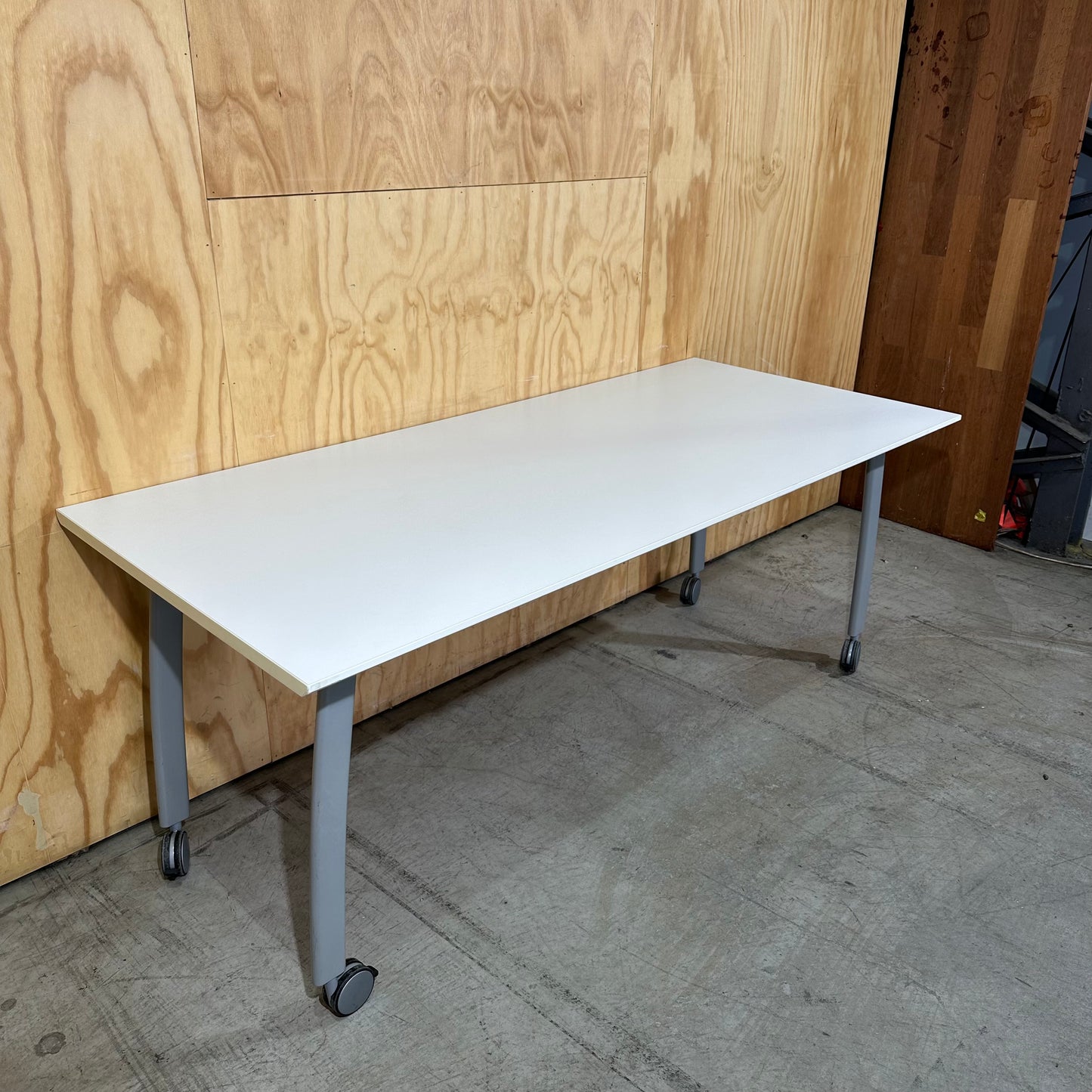 White Table on Castor Wheels