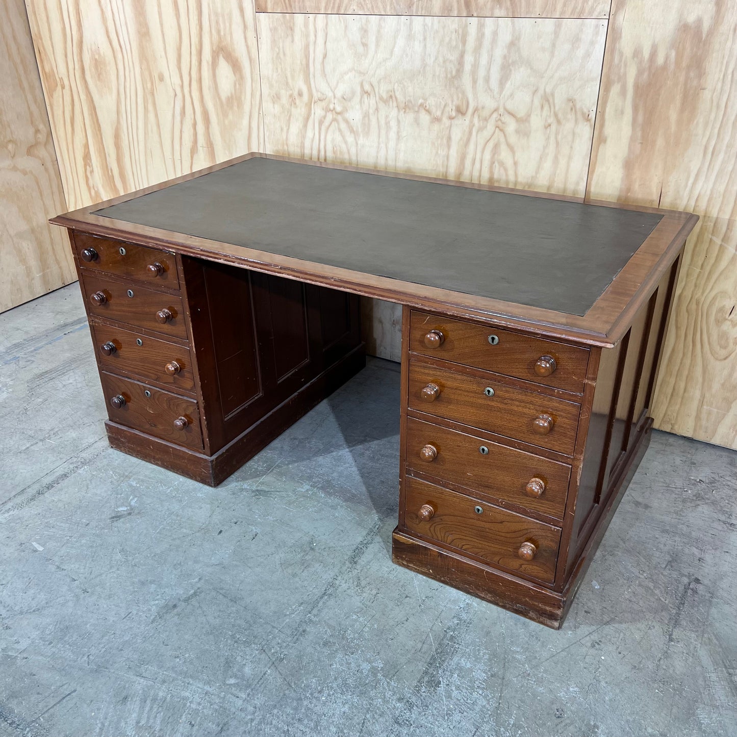 Antique timber executive desk with black leather top