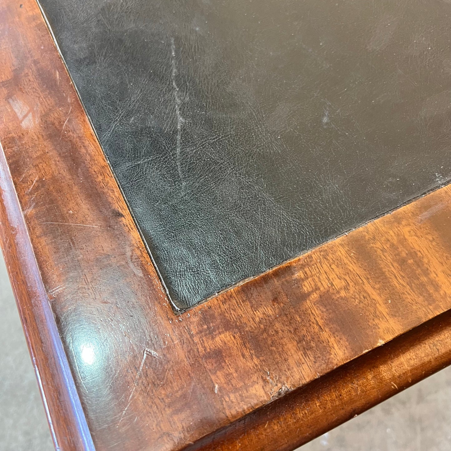 Antique timber executive desk with black leather top