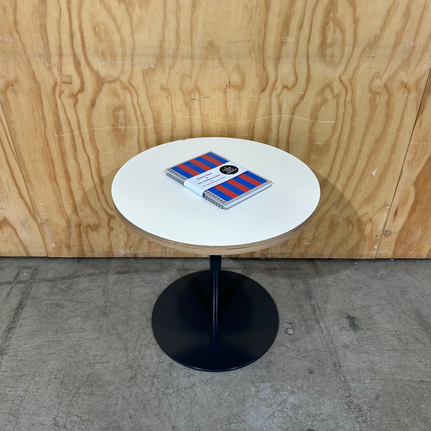 Round Coffee Table with Plywood Edge on Black Base