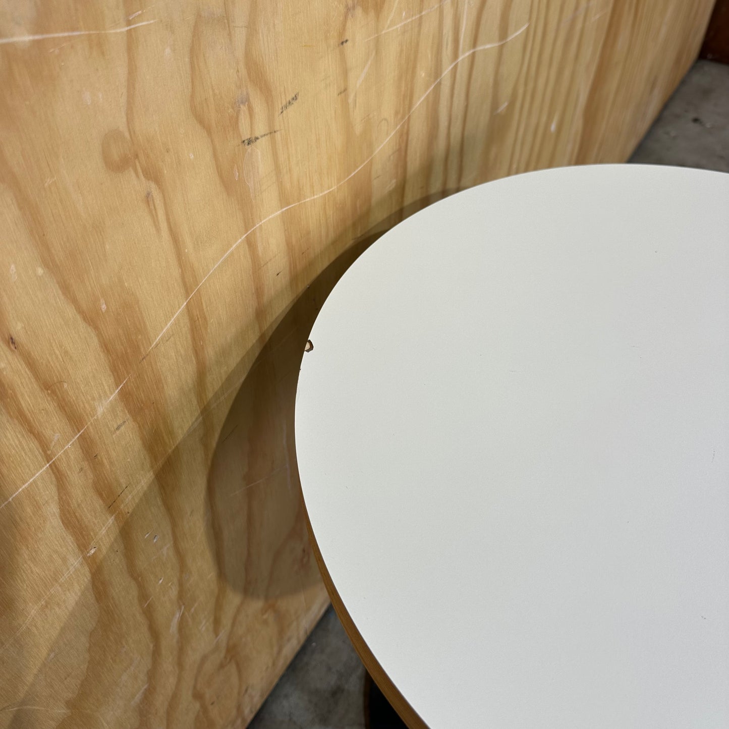 Round Coffee Table with Plywood Edge on Black Base