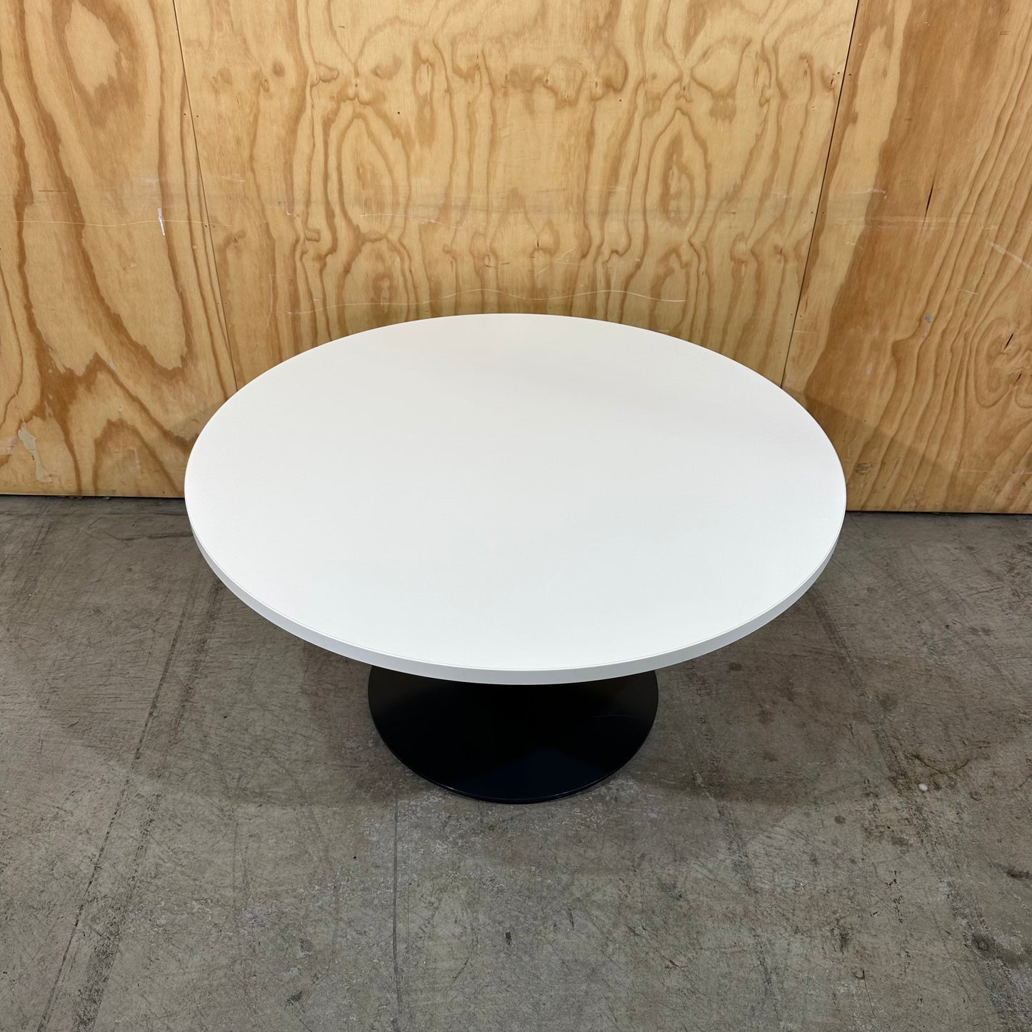 White Round Table with Black Base