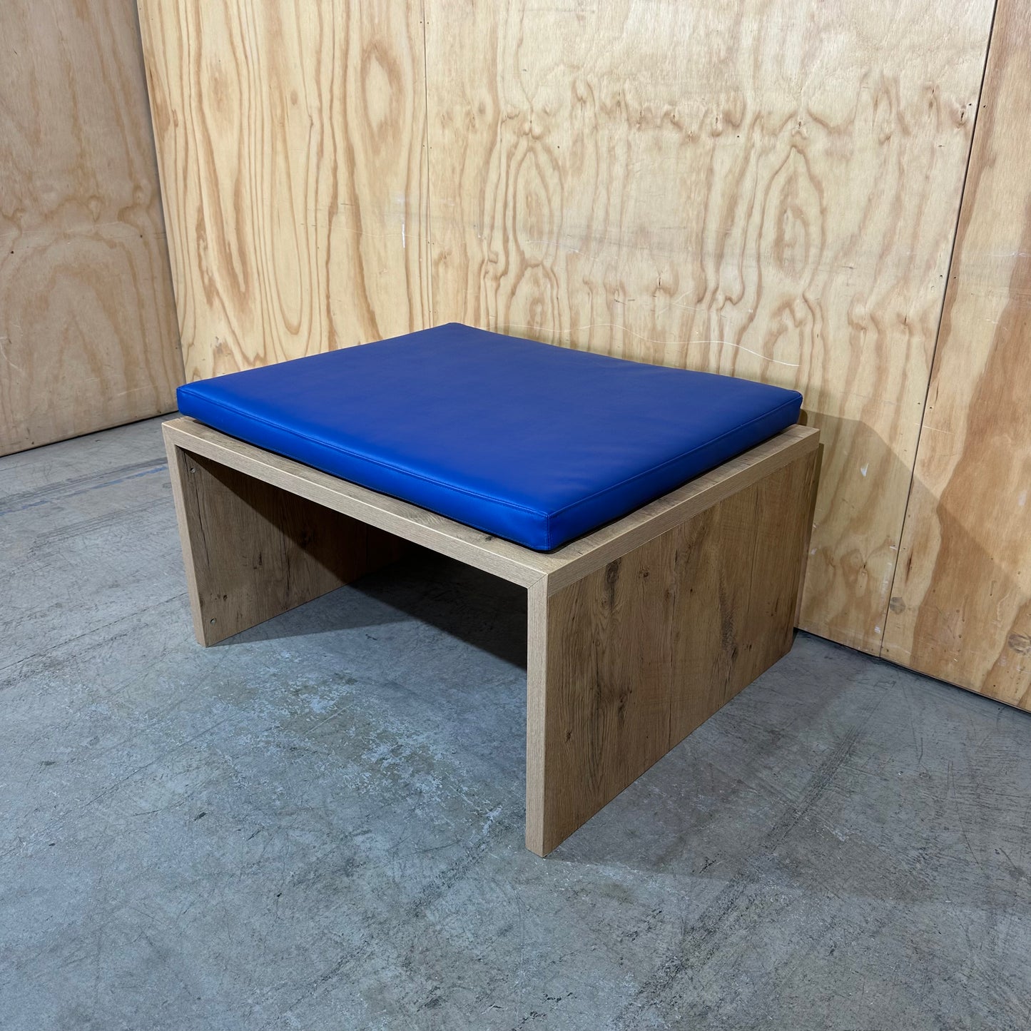 Contemporary Oak Plinth Bench with Electric Blue Cushion