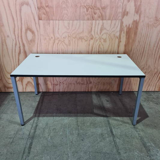 White meeting room table on metal legs